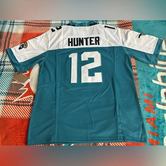 Jacksonville Nike Teal and White Sports Jersey - Picture 2 of 2